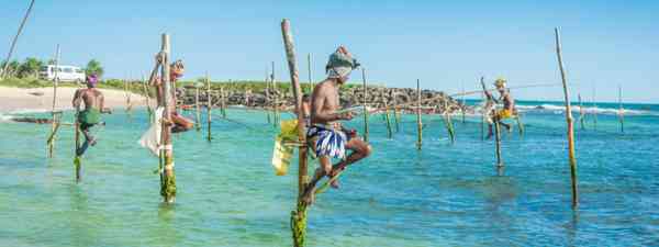 Traditional fishermen in Sri Lanka (Dreamstime)