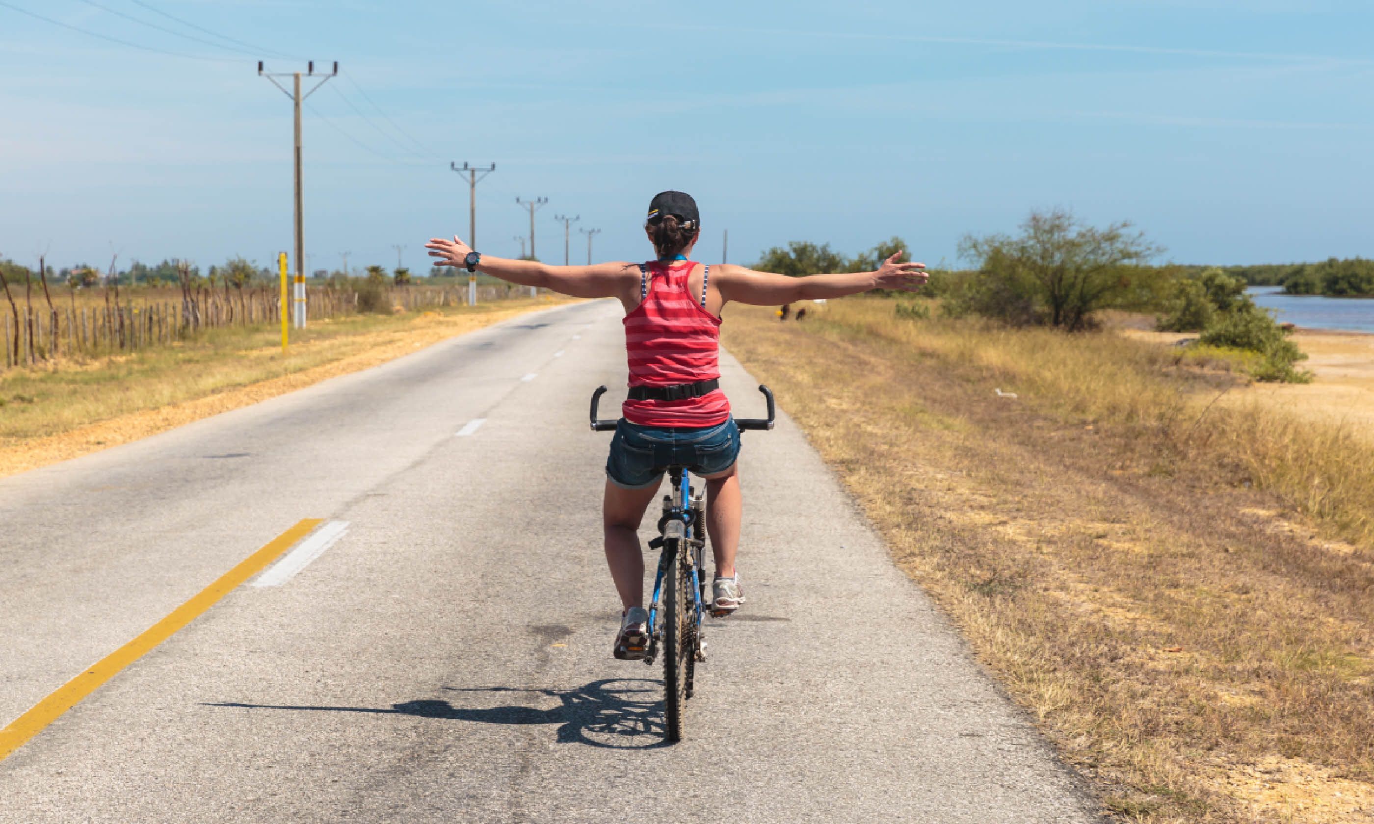 Relaxing cycling on the road of Trinidad, Cuba (Shutterstock)