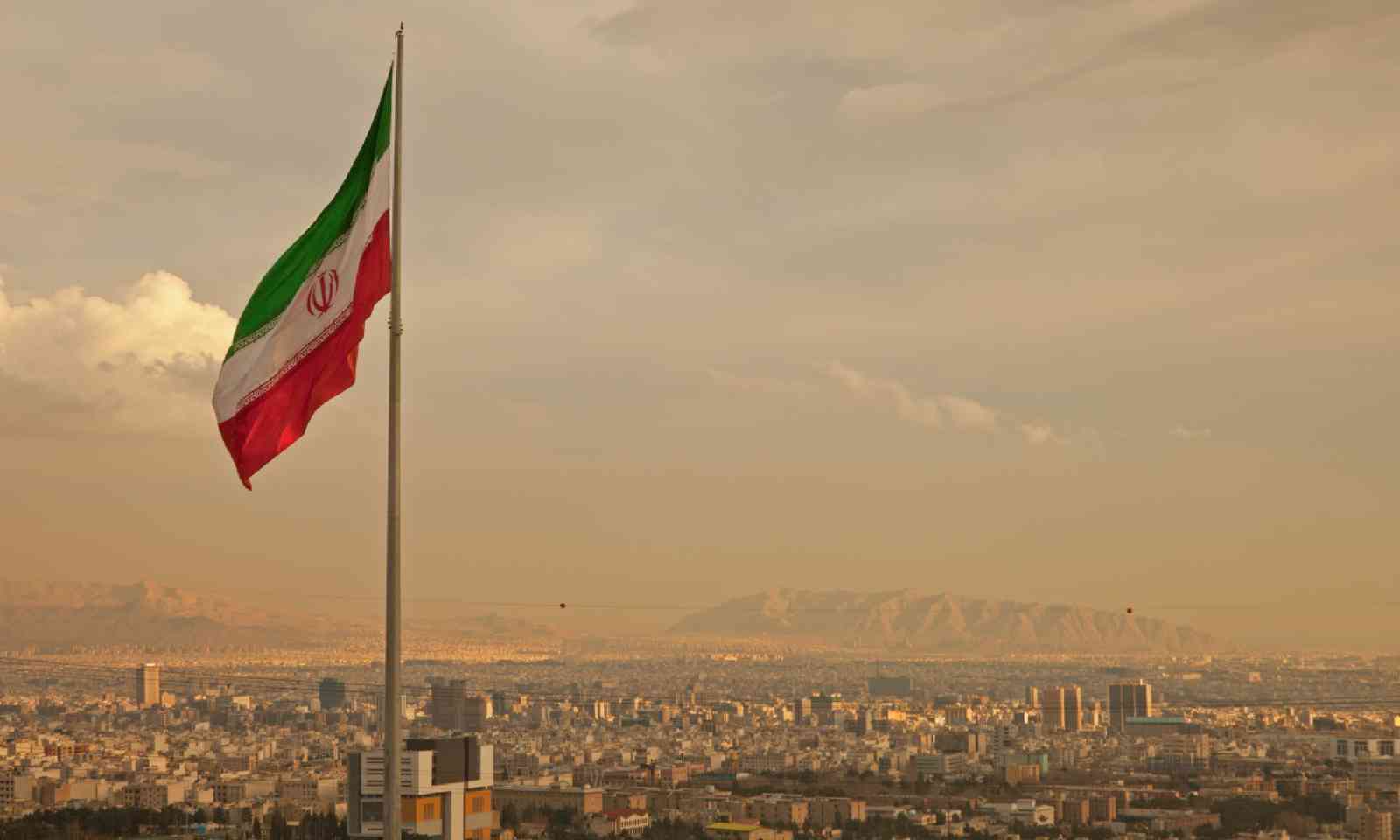 Iran flag in Tehran (Dreamstime)