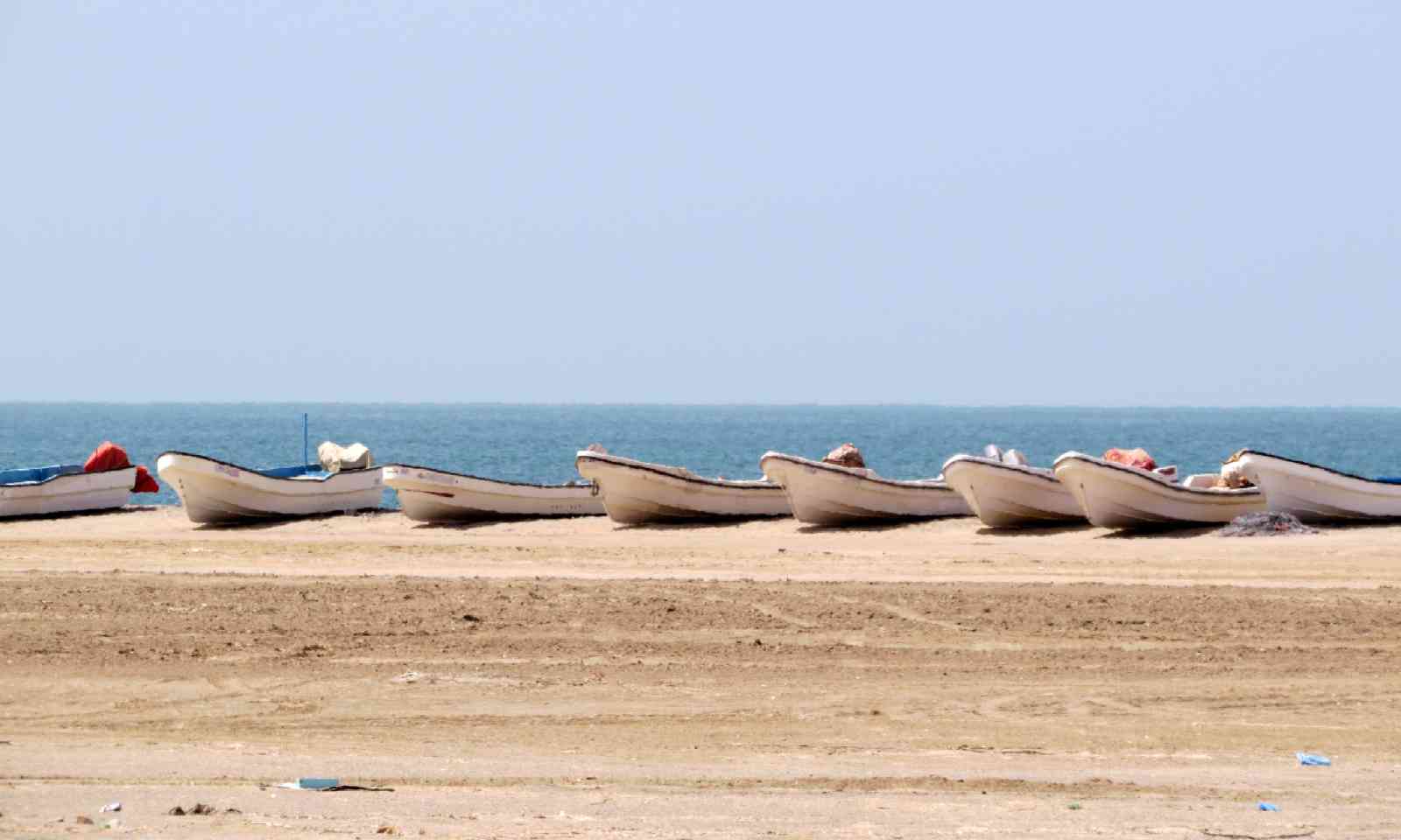 Fishing boats on east coast of Masirah Island (Hazel Plush)