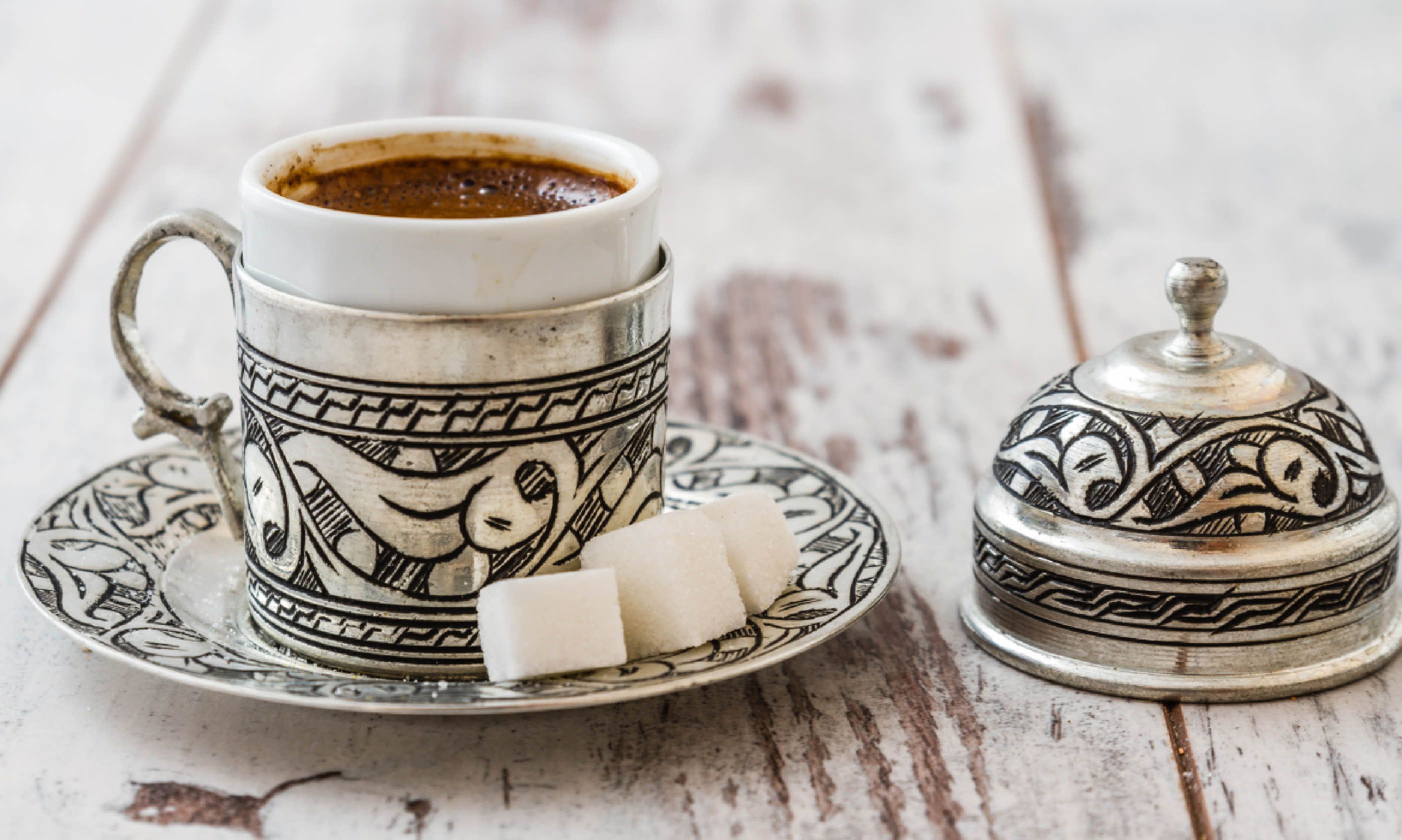 Turkish coffee served in a traditional silver cup (Dreamstime)
