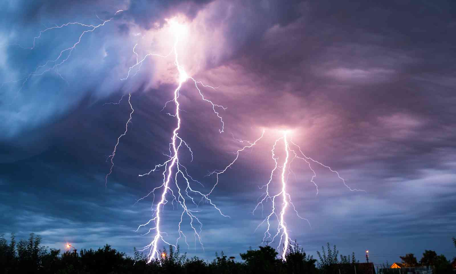 Lightning storm over forest (Shutterstock.com) 