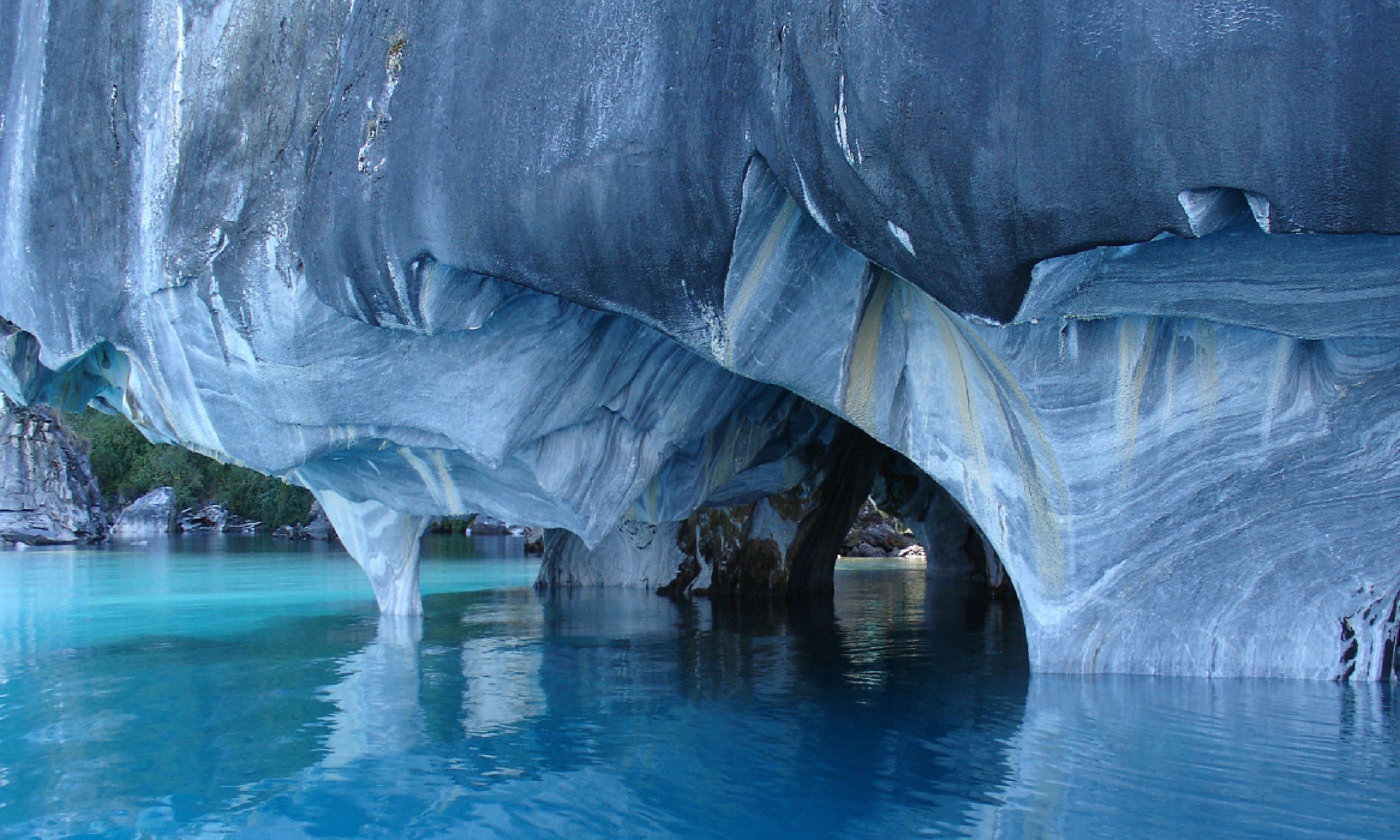 8 невероятных. Хенераль вильегас. Гора дьявола штат вайоминг. Мраморные пещеры патагонии чили. Айсберги антарктиды.